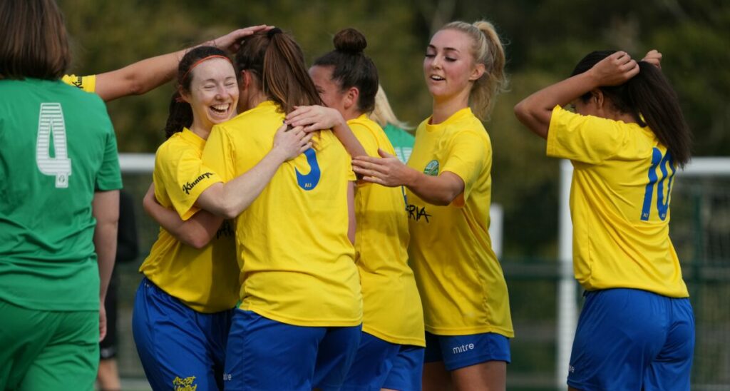 Ascot United Women celebrate scoring against Oxford City in the FA Cup